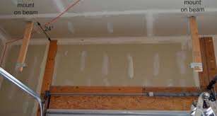 White ceiling the hyloft 45 in. Diy How To Build Suspended Garage Shelves Building Strong
