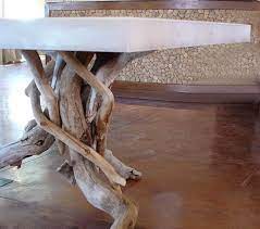 54 w shelby dining table solid mango wood traditional round antique oak finish. Modern And Natural Float Dining Table With A Unique Base Stone Dining Table Glass Top Dining Table Driftwood Table