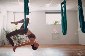 There were only four of us in the class and only one person had been before, so i was surrounded by newbies like me. Aerial Antigravity Yoga Concept Woman Practicing Fly Yoga In Anti Gravity Yoga Studio Using Green Hammock Stock Photo Picture And Royalty Free Image Image 152359245