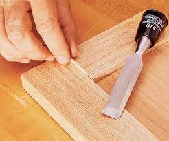 Using a stirrer and disposable paper plate, mix the wood filler according to the directions of the manufacturer. Fill The Gaps