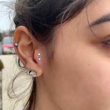 Double Tragus Piercing Trend Popsugar Beauty Photo 4 Earringusedfortraguspiercing Ear Piercings Tragus Tragus Piercing Jewelry Earings Piercings