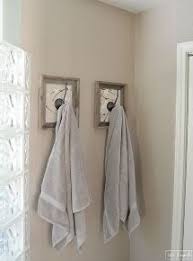 Make your bathroom towel rack ideas serve a dual purpose. Bathroom Hooks For Towels Ideas Background