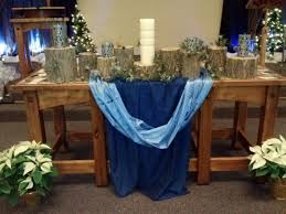 Log Rounds On Communion Table As An Alternative Advent Wreath Would Also Be Rustic For Lent Wilderness Church Altar Decorations Communion Table Altar Design