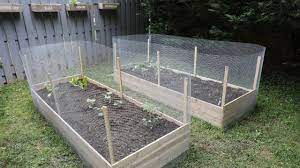 A vegetable garden in landscape design is. How To Build A Diy Raised Garden Bed And Protect It With A Metal Fence