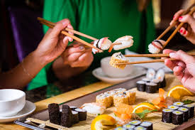 First, pick up a single chopstick, sandwiching it between your this time, try not to move the bottom chopstick. New To Sushi A Simple Guide To Eating Sushi For Beginners