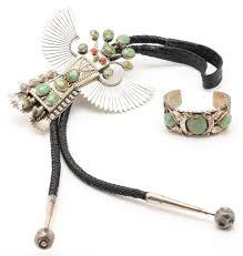 Lot 1122: 3 Native American Jewelry Related Items, Jerry Roan Eagle Katsina  Bolo, Cuff Bracelet, & Book