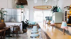 Us Design Studio Basic Projects Has Gutted A Restaurant In South Carolina And Transformed The Dark Interior Into An Ecl Restaurant Decor Basic Kitchen Interior