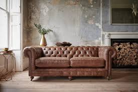 I would go with lite blue walls and beige or dark blue carpeting. Colour Palettes To Complement Your Brown Leather Sofa