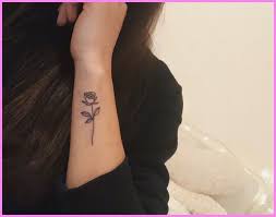 A red rose tattoo, for instance, symbolizes love, purity, mysticism, and passion, while a pink one will represent grace, gratitude, and affection. Pin On Tattoo For Guys Tiny Rose Tattoos Side Wrist Tattoos Tattoos