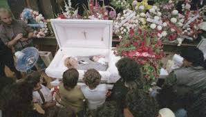At least one person was killed and five others were critically injured overnight after gunfire broke outside a mcdonald's in seattle. The Gravestone And Open Casket Funeral Of Pregnant