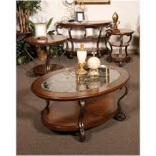 The matinee coffee table and end table set will become the focal point of your living room. T517 0 Ashley Furniture Nestor Medium Brown Oval Cocktail Table