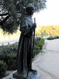 The one in the movie has been photoshopped to include a nonexistent tower, but the original is itself beautiful and well. Junipero Serra San Juan Bautista California Statues Of Religious Figures On Waymarking Com