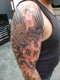 16 Realistic Eagle And Snake Tattoo Designs With Meanings Petpress Eagle And Snake Tattoo Snake Tattoo Eagle Tattoos