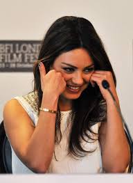 Actress Mila Kunis Smiles As She Talks To The Media During The Black Swan Press Conference As Part O Mila Kunis Cartier Love Bracelet Cartier Love Collection