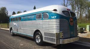 Image result for Silver 1990 Greyhound Bus