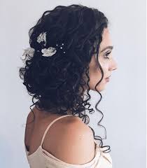 I don't know why, but for some weird reason, this hairstyle gives one princess vibes. Stunning Wedding Hairstyles For Naturally Curly Hair Southern Living