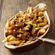 Poutine râpée is an acadian boiled dumpling made from potato stuffed with pork in the centre. The Ultimate Allergy Friendly Poutine