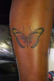 9 Beautiful Tattoos On Dark Skin For Males And Females Styles At Life Tattoos For Black Skin Red Ink Tattoos Dark Skin Tattoo