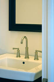 The sink is in a new location, and so is the toilet, although the latter is very close to where it was. Remodeling Your Powder Room Diy