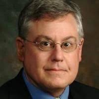 Improving the lens design and performance of a contemporary electromagnetic  shock wave lithotripter.