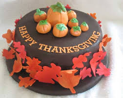 We're loving the idea of place cards, as we now move from the food to the decor! Easy Thanksgiving Cake Decorating Ideas Paper Jewels And Other Crafty Gems Cute Fall Cupcake And Head On Over To 100 Layer Cake For Some Helpful Tips For Hosting Friendsgiving