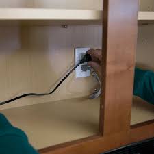 Pass a length of electrical conduit through the hole and attach the conduit to the box with. How To Install Under Cabinet Lighting
