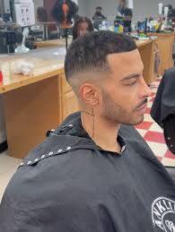 A high & tight worthy of the uniform 💚  #paulmitchell#student#cosmetology#highandtightfade