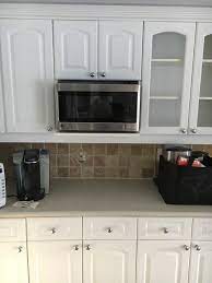 Using a primer, such as this one, will block any stains that are coming through. Travertine Tile Makeover Help Limewash Or Paint