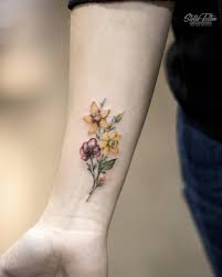 50 Sweet Summer Colorful Flower Tattoo Designs Flower Tattoo Daffodil Tattoo Feather Tattoo Placement