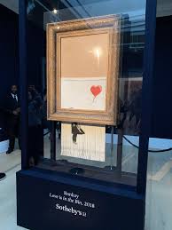 If playback doesn't begin shortly, try restarting your device. Today I Went To See The Infamous Banksy Shredded Artwork Now Renamed Love In The Bin On Display Until This Sunday At Sotheby S Pics