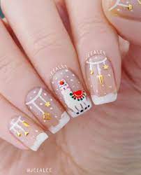 Use a dotting tool to finish the hat with white nail polish, then create more dots on the bottom for beard. 42 Festive Christmas Nail Ideas 2020 Christmas Nail Art Ideas