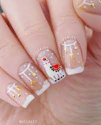 A beautiful and simple nail art! 42 Festive Christmas Nail Ideas 2020 Christmas Nail Art Ideas