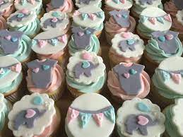 Snug the green tissue paper in between the cupcakes. Elephant Baby Shower Cupcakes Baby Shower Cupcakes For Girls Baby Shower Cupcakes For Boy Baby Shower Cupcakes