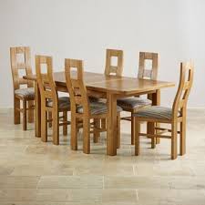 The set of 4 high back chairs are upholstered in tan coloured bycast leather with an oak frame and legs. Oak Table And Chairs You Ll Love In 2021 Visualhunt