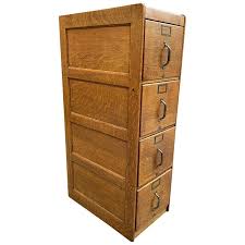 Finished in a classic mahogany laminate, storage components coordinate with other magons furniture which makes customizing easy. Tiger Oak Four Drawer File Cabinet For Sale At 1stdibs