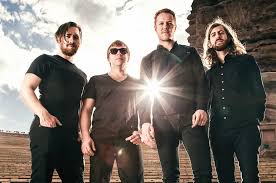 Band members include frontman dan reynolds, bassist ben mckee, guitarist wayne sermon, and drummer daniel platzman. Imagine Dragons Lack Musical Cohesion On Origins The Heights