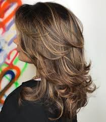 Dark brown hair with blonde highlights is a hair color trend that has been turning heads left and right for decades, and for good reason. 25 Fabulous Looks With Blonde Highlights On Brown Hair
