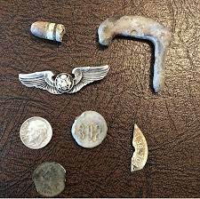 This effectively a creates a changing electric field, which sets up a changing magnetic field around the metal. Awesome Day Of Metal Detecting Does Anyone Know What The Lead Piece Is That Has The 392 And The Broken Token Like Thing With All The Numbers Metaldetecting