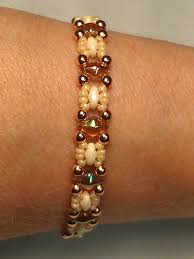 Diamond Duo Trestle From Around The Beading Table I Used Old Bourbon Diamond Duos Super Duos In Super Duo Beads Beaded Bracelets Beaded Jewelry Tutorials