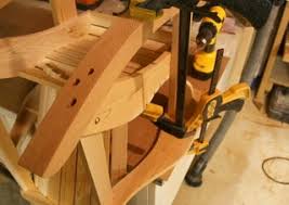 This stylish kid's rocking chair is made with 5 pieces of wood, is held together by just 2 tension bolts, and conveniently collapses flat for shipping or storage. Child Size Adirondack Rocking Chairs Instructables