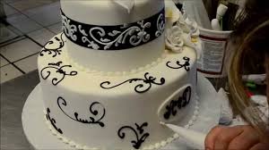 From simple cakes to unique designs, we share tips and answer common questions on one of our favorite rustic cakes is decorated with fondant icing to resemble the couple's initials carved into a tree (such a unique wedding cake design!). How To Decorate A Simple But Elegant Wedding Cake Youtube