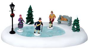 The other new attractions are clinton's butchers shop, skating rinks and more skaters. Christmas Village Animated Skating Scenes Christmas Villages
