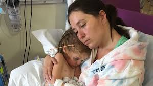 Mum shaves head after daughter is diagnosed with brain tumour