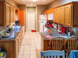 White painted cabinets can make a smaller kitchen appear larger just like painting the walls a lighter color can do. Golden Oak Color Honey Paint Color Kitchen Colors With Light Oak Cabinets Kitchen Paint Colors With Dark Oak Cabinets Kitchen Paint Colors With Wood Cabinets What Color Is Oak Best Kitchen Colors