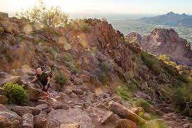 The english name is derived from its shape, which resembles the hump and head of a kneeling camel. Hiking Camelback Mountain Phoenix Arizona Mountain Park Ranch Real Estate Shirley Coomer 2020