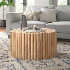 The entire table is finished in a tobacco wash finish that accentuates the natural grain of its solid. Vitiello Solid Wood Drum Coffee Table Table Base Color Brown Drum Coffee Table Coffee Table Wood Solid Wood Coffee Table