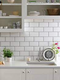 Subway tile backsplash is a great way to protect the wall from splashes and smears as well as accentuating your kitchen or bathroom. Cush And Nooks Top Style Brick Kitchen Kitchen Wall Tiles Ceramic Kitchen
