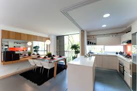 For a smaller kitchen diner have ceiling mounted shallow cupboards. Kitchen Diner Interior Design Ideas