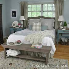 Bedroom In Light Blue Grey Wood Floors Light Rug Love This Farmhouse Style Bedr Master Bedroom Remodel Rustic Master Bedroom Farmhouse Style Master Bedroom