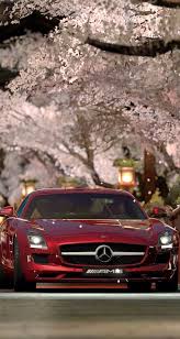 Red Mercedes Benz Beneath A Cherry Blossom Tree Mercedes Benz Wallpaper Mercedes Wallpaper Mercedes Benz Sls Amg